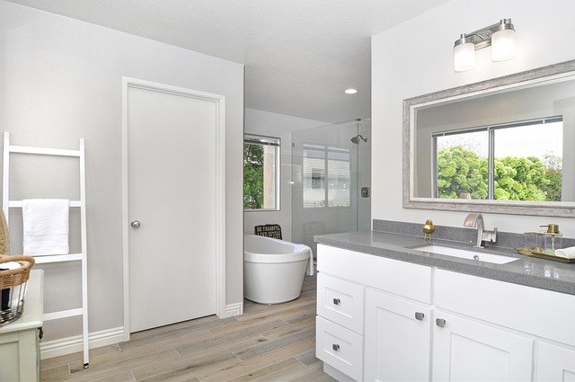 Spa-style bathroom with tiled shower and freestanding tub